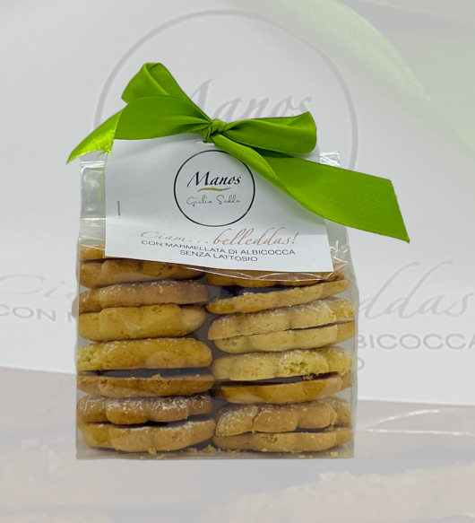 Ciam…belleddas! Ciambelle con marmellata di albicocca senza lattosio. Manos di Giulia Sedda